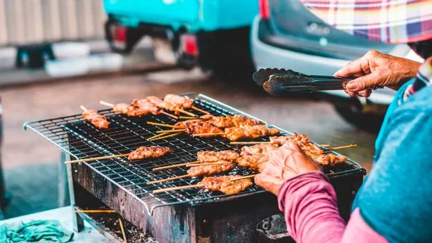 Street-side grilled pork skewers (moo ping)